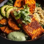 Sheet Pan Chipotle Salmon drizzled with cilantro lime special sauce