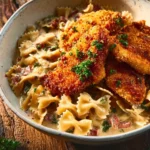 Southern Style Creamy Parmesan Chicken Pasta served in a bowl.
