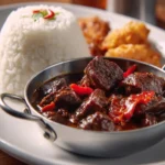 Delicious Rabo Encendido dish, showcasing vibrant ingredients and presentation.
